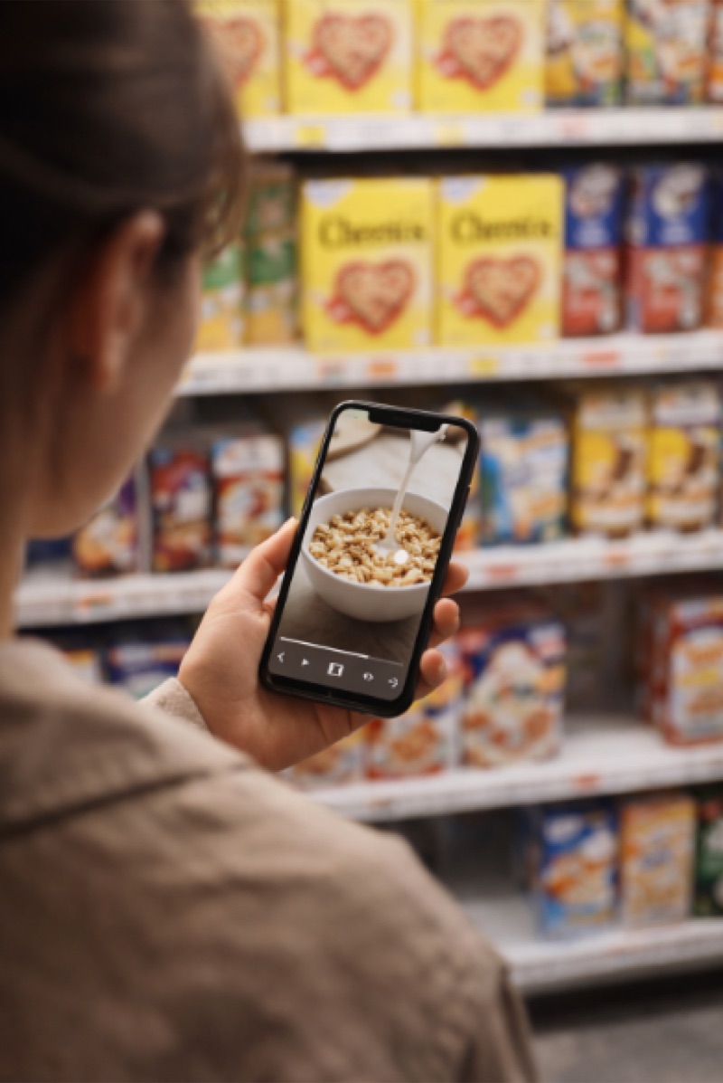 Rewarded media on phone at grocery store